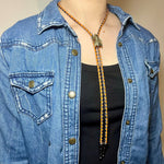 Load image into Gallery viewer, SOLD - Fly Bolo Tie – Orange &amp; Black Cord
