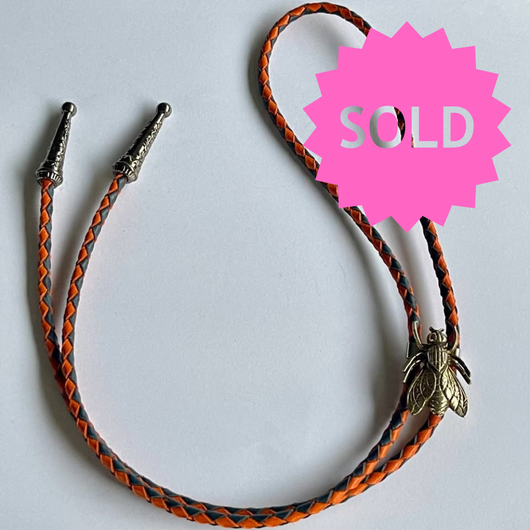 SOLD - Fly Bolo Tie – Orange & Black Cord