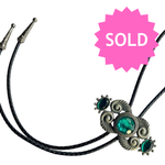 Load image into Gallery viewer, Bolo Tie – Black Cord &amp; Emerald Green Stones
